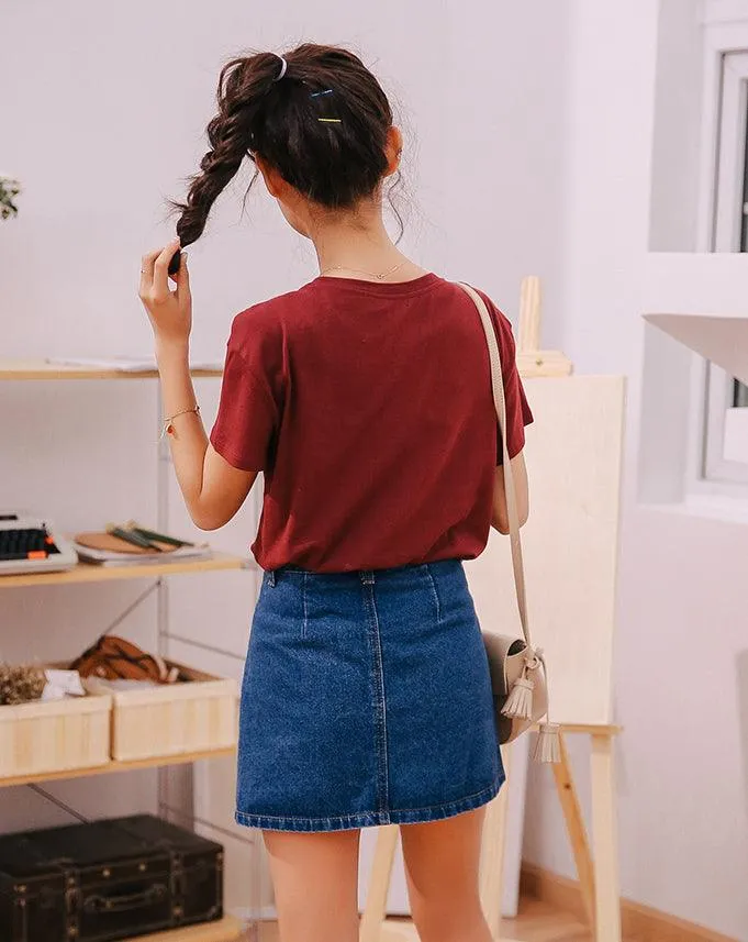 A  DENIM BUTTON-UP MINI